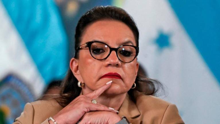n this file photo taken on November 24, 2022, Honduras’ President Xiomara Castro gestures during the launching of the “Integral Plan for the Treatment of Extortion and Related Crimes”, which aims to tackle the local ‘maras’ (gangs), at the Presidential House in Tegucigalpa. AFPPIX