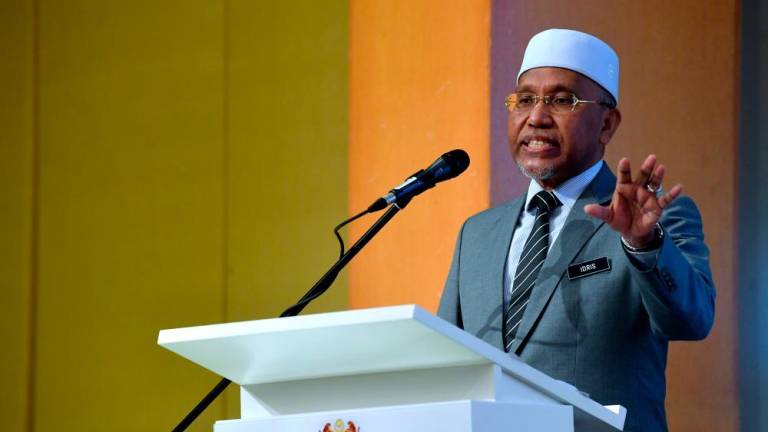 PUTRAJAYA, 10 August -- Minister in the Prime Minister’s Department (Religious Affairs) Datuk Idris Ahmad when speaking at the Inauguration Ceremony of Sulh ‘Outreach Programme’ (Or Sulh) Year 2022 at Dewan Seroja today. BERNAMAPIX