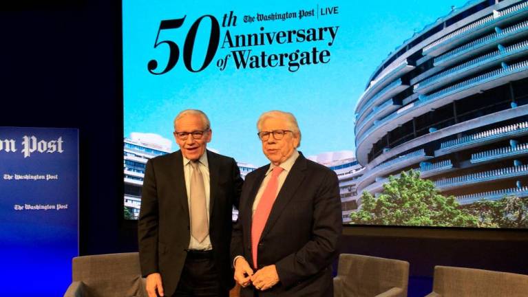 Journalists Bob Woodward (L) and Carl Bernstein (R) participate in an event marking the 50th anniversary of the Watergate burglary at the Washington Post office in Washington, DC, June 17, 2022. AFPPIX