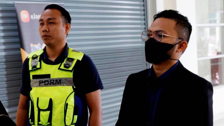 Muhammad Fathi Na’im was also ordered to surrender his passport to the court and to report himself at a police station once a month. BERNAMAPIX