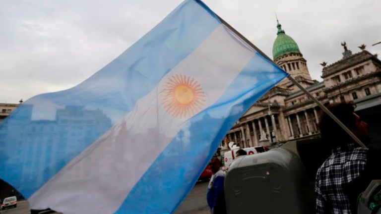 A man waves an Argentine national flag in Buenos Aires, Argentina, January 10, 2019. REUTERSPIX