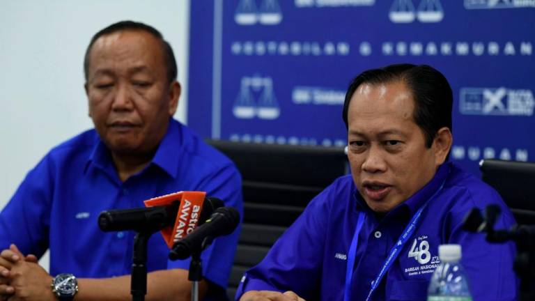 KOTA KINABLAU, July 2 - UMNO secretary -general Datuk Seri Ahmad Maslan (right) during a press conference in conjunction with the Sabah Barisan Nasional Convention at the Penampang Commercial and International Center (ITCC) today. BERNAMAPIX