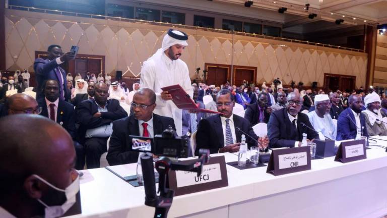 FILE PHOTO: Officials attend a signing agreement for a national dialogue with Chad's transitional military authorities and rebels at Sheraton Hotel in Doha, Qatar August 8, 2022. - REUTERSPIX