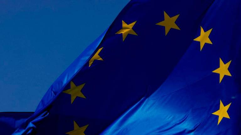 European Union flags flutter outside the EU Commission headquarters in Brussels, Belgium/REUTERSPix