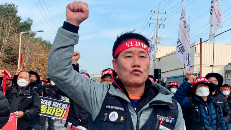 FILE PHOTO: Unionized truckers shout slogans during their rally as they kick off their strike in front of transport hub Uiwang, south of Seoul, South Korea November 24, 2022. REUTERSPIX