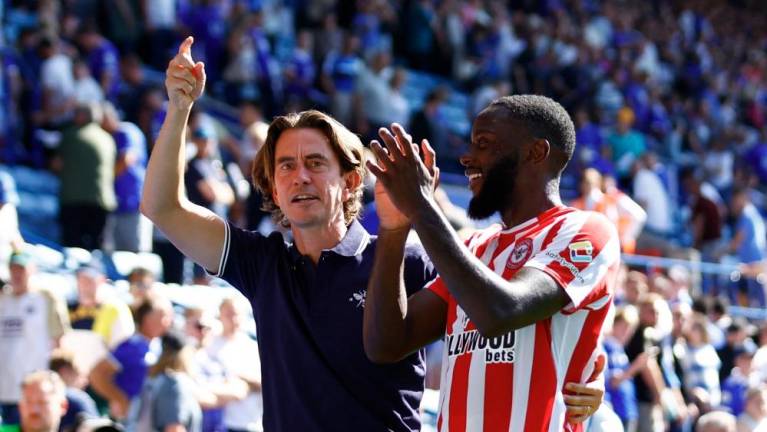 Brentford manager Thomas Frank (left) celebrates with Josh Dasilva after the English Premier League match against Leicester City at the King Power Stadium. – REUTERSPIX