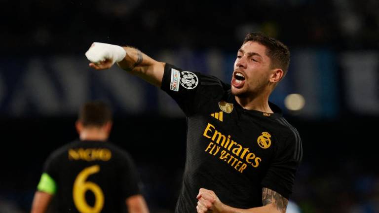 Football - Champions League - Group C - Napoli v Real Madrid - Stadio Diego Armando Maradona, Naples, Italy - October 3, 2023Real Madrid's Federico Valverde celebrates after Napoli's Alex Meret scores an own goal and the third for Real Madrid. REUTERSPIX