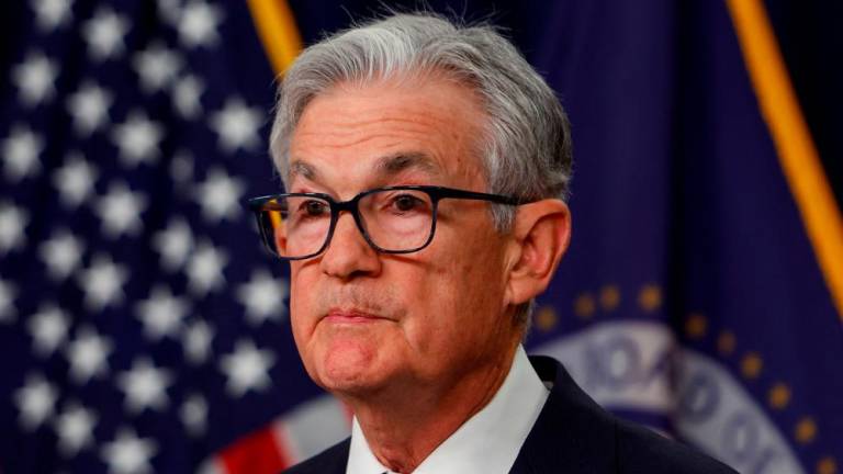 Powell holding a press conference after the release of the Fed policy decision to leave interest rates unchanged in Washington on Wednesday. – Reuterspic