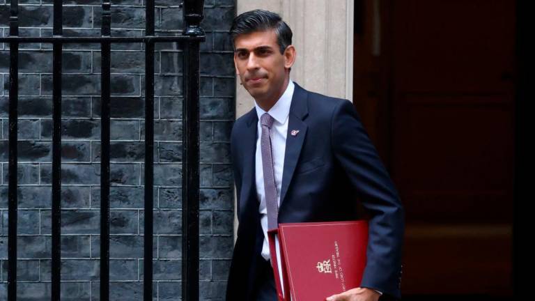 British prime minister Rishi Sunak’s government agreed a deal to avoid a first parliamentary defeat. AFPPIX