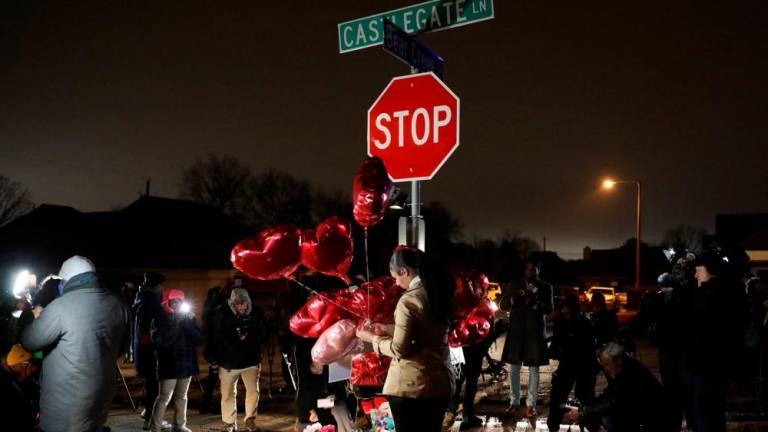 People attend a vigil at the intersection of Castlegate Lane and Bear Creek Cove, where Nichols was beaten by Memphis Police officers, in Memphis, Tennessee, U.S. January 30, 2023/AFPPix