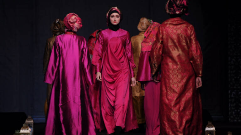 Women cancer survivors take part in fashion show