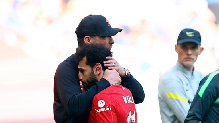 Soccer Football - FA Cup - Final - Chelsea v Liverpool - Wembley Stadium, London, Britain - May 14, 2022 Liverpool’s Mohamed Salah with manager Juergen Klopp after being substituted REUTERSPIX