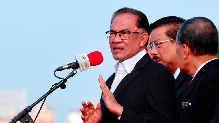 Prime Minister Datuk Seri Anwar Ibrahim (third,right) - BERNAMAPIX