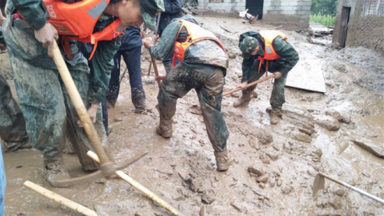 Landslide in southwest China kills eight, 17 missing