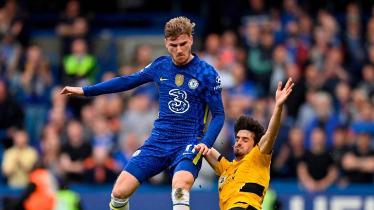 FILE PHOTO: Soccer Football - Premier League - Chelsea v Wolverhampton Wanderers - Stamford Bridge, London, Britain - May 7, 2022 Chelsea’s Timo Werner in action with Wolverhampton Wanderers’ Francisco Trincao REUTERSPIX