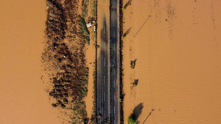 This aerial view taken on September 8, 2023, shows a partially destroyed road in a flooded area near the village of Itea, central Greece. AFPPIX