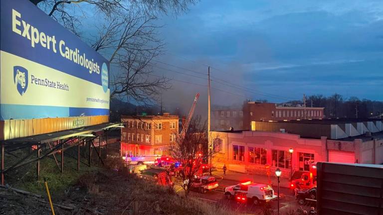 A general view shows smoke coming out from a chocolate factory after fire broke out, in West Reading, Pennsylvania, U.S., March 24, 2023 in this picture obtained from social media. REUTERSPIX