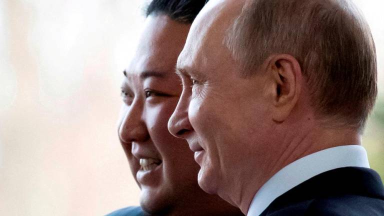 Russian President Vladimir Putin and North Korea’s leader Kim Jong Un pose for a photo during their meeting in Vladivostok, Russia, April 25, 2019. Picture taken April 25, 2019. REUTERSPIX