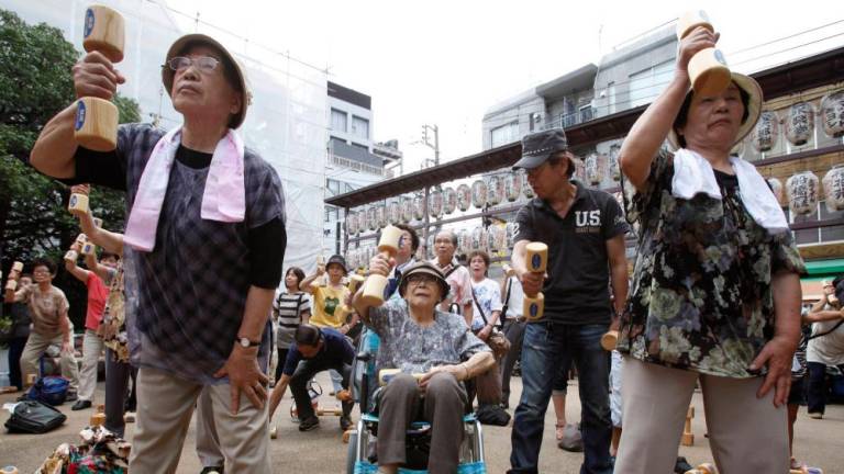 Japan has seen ballooning costs for elderly care with not enough young people to fill jobs and pay for various social and welfare programmes. REUTERSPIX