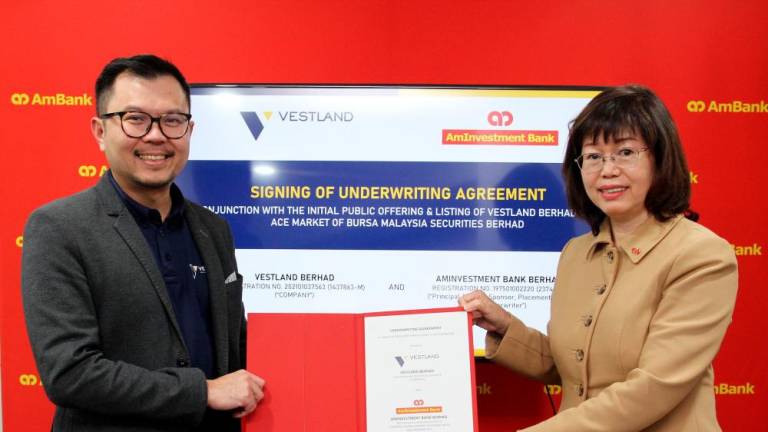 From left: Vestland’s group managing director Datuk Liew Foo Heen and AmInvestment Bank CEO Tracy Chen Wee Keng, at the ceremony.