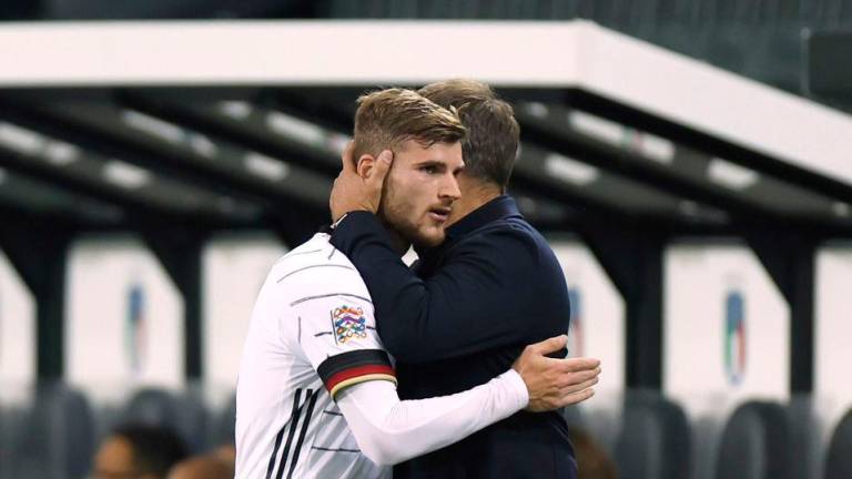 Soccer Football - UEFA Nations League - Group C - Germany v Italy - Borussia-Park, Moenchengladbach, Germany - June 14, 2022 Germany’s Timo Werner with coach Hansi Flick after he was substituted REUTERSPIX