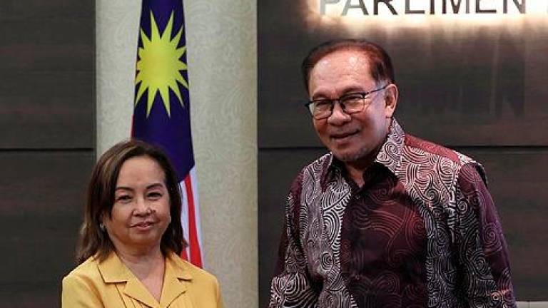 Prime Minister Datuk Seri Anwar Ibrahim and Deputy Speaker of the House of Representatives of the Philippines Gloria Macapagal Arroyo. BERNAMAPIX