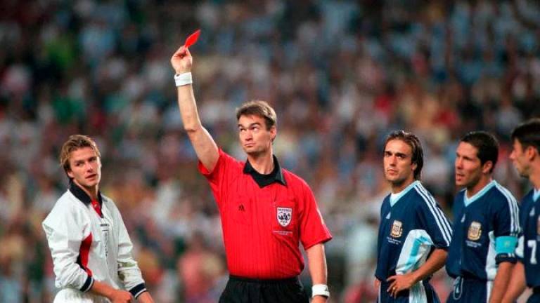 David was sent off during a game with Argentina at the 1998 World Cup. Credit: Getty - Contributor