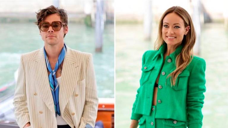 Harry Styles (left) and Olivia Wilde had kept their relationship fairly private. – AFP