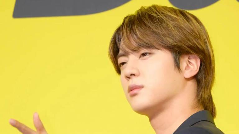 Jin is the first member of BTS to enlist in the military. – ImaZins/Twitter