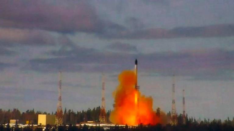 (FILES) In this file video grab made from a handout video footage released by the Russian Defence Ministry on April 20, 2022 shows the launching of the Sarmat intercontinental ballistic missile at Plesetsk testing field, Russia. AFPPIX