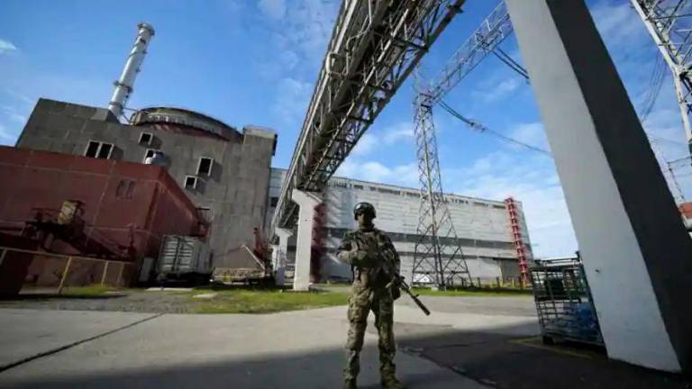 A Russian serviceman guards in an area of the Zaporizhzhia Nuclear Power Station in territory under Russian military control, southeastern Ukraine - AFPPIX