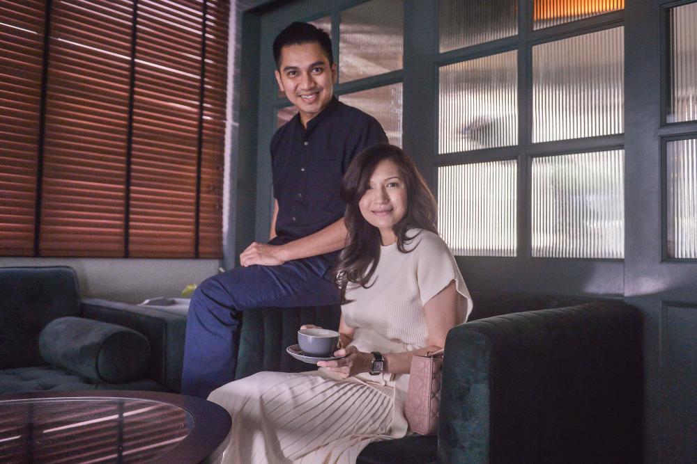 Najmi (left) and Jezvynna initially thought of setting up Henry &amp; Camille as a vape store. – ASYRAF RASID/THE SUN