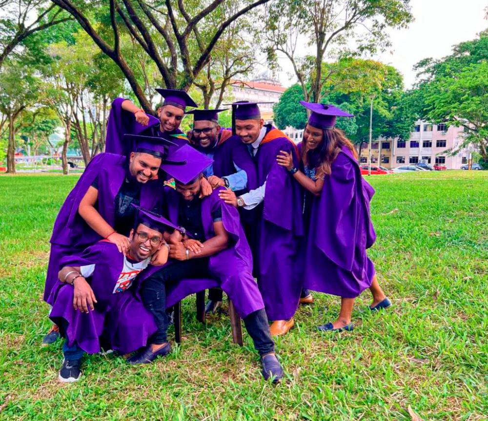 $!Jeya and his friends sharing a fun moment during their graduation.