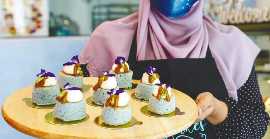 Khalilah’s signature cake and the most in-demand one - the Bunga Telang Coconut Cake. – Pictures courtesy of Khalilah Mohamad