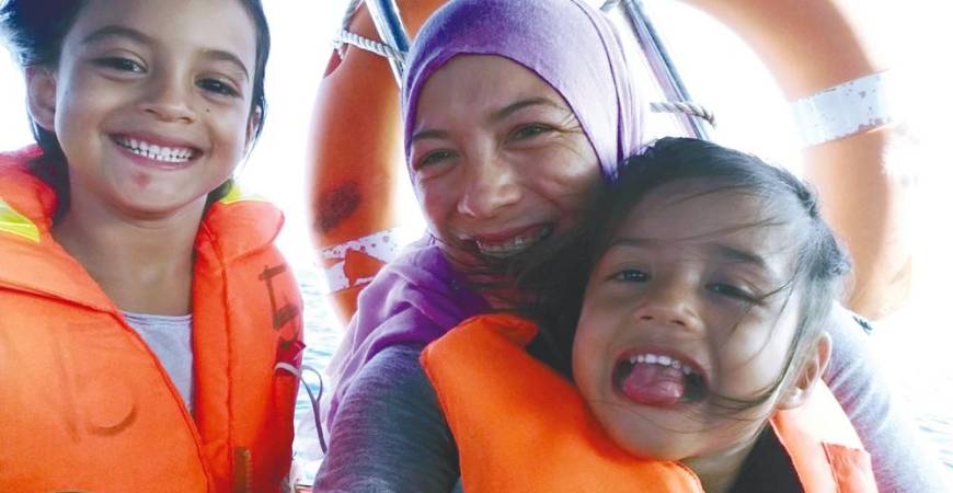 Sharifah is happy that her two daughters also love nature and want to protect it.
