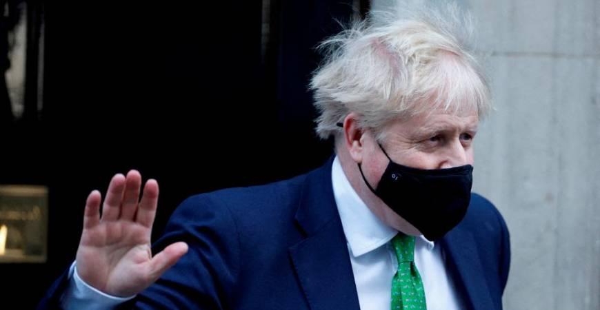 FILE PHOTO: British Prime Minister Boris Johnson waves as he leaves Downing Street, in London, Britain, January 19, 2022. REUTERSpix