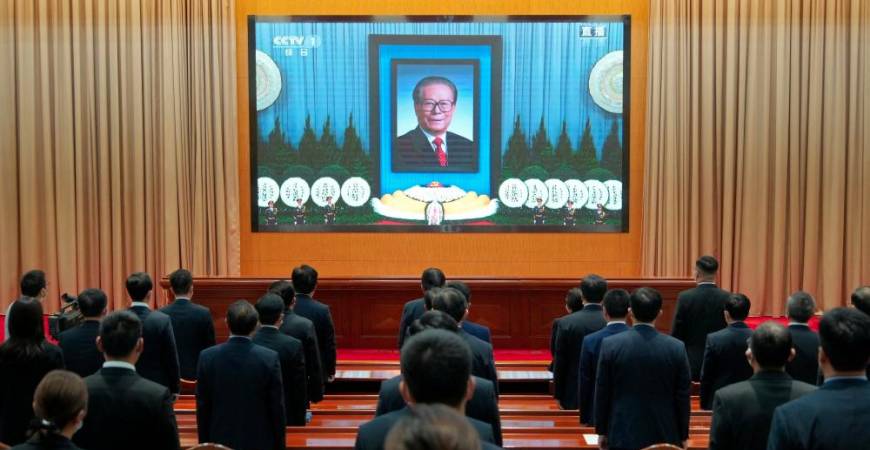 Members of the Communist Party of China watch the live broadcast of the memorial meeting for former Chinese President Jiang Zemin, in Yantai, Shandong province - REUTERSPIX