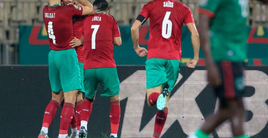 Morocco’s defender Achraf Hakimi (2ndL) celebrates with teammates after scoring his team’s second goal during the Africa Cup of Nations (CAN) 2021 round of 16 football match between Morocco and Malawi at Stade Ahmadou-Ahidjo in Yaounde on January 25, 2022. AFPPIX