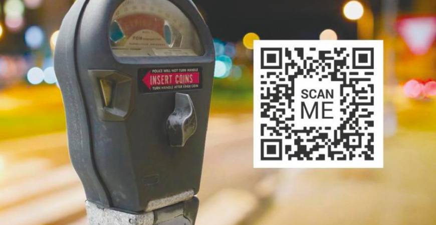 Scammers are putting fake QR codes on parking meters.
