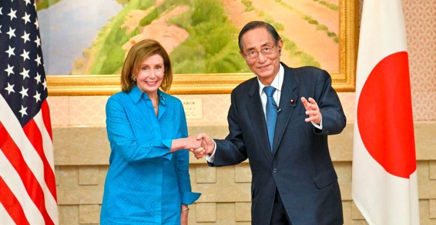 US House Speaker Nancy Pelosi (L) shakes hands with Hiroyuki Hosoda, speaker of Japan’s House of Representatives, during a meeting in Tokyo on August 5, 2022. AFPPIX