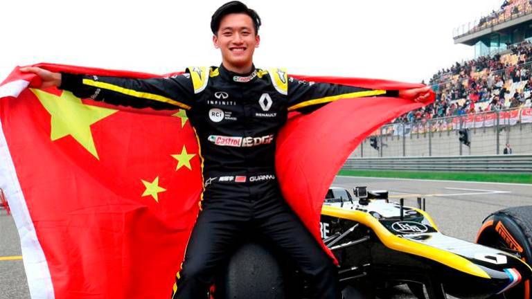 Chinese driver Zhou extends contract with Alfa Romeo into 2023