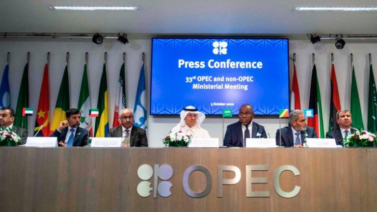 Representatives of Opec member countries attend a press conference after the joint ministerial monitoring committee and the Opec and non-Opec ministerial meeting in Vienna on Wednesday, Oct 5. – AFP