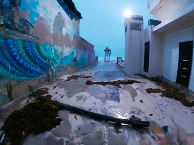 Intense wind and rain caused some damage to structures on the beach in the resort city of Cancun. — AFP