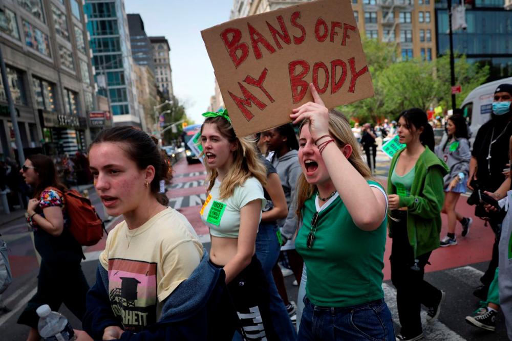 File photo: Students and others protest for abortion rights as they march from Union Square, after the leak of a draft majority opinion written by Justice Samuel Alito preparing for a majority of the court to overturn the landmark Roe v. Wade abortion rights decision later this year, in Manhattan in New York City, New York, U.S., May 5, 2022. REUTERSpix
