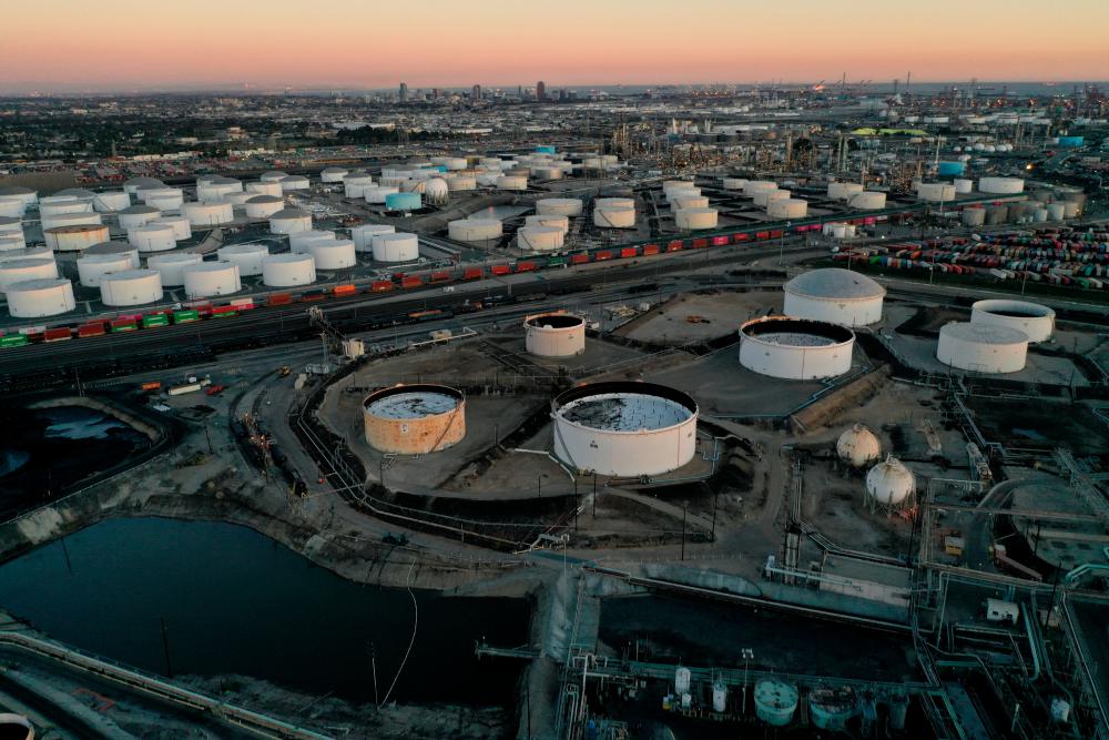 Storage tanks for crude oil, petrol, diesel, and other refined petroleum products at the Kinder Morgan Terminal in Carson, California.– Reuterspix