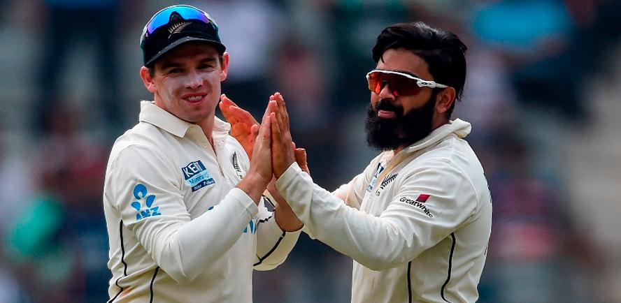New Zealand’s Ajaz Patel (right) celebrates with his captain Tom Latham during the second day of the second Test cricket match against India. – AFPPIX