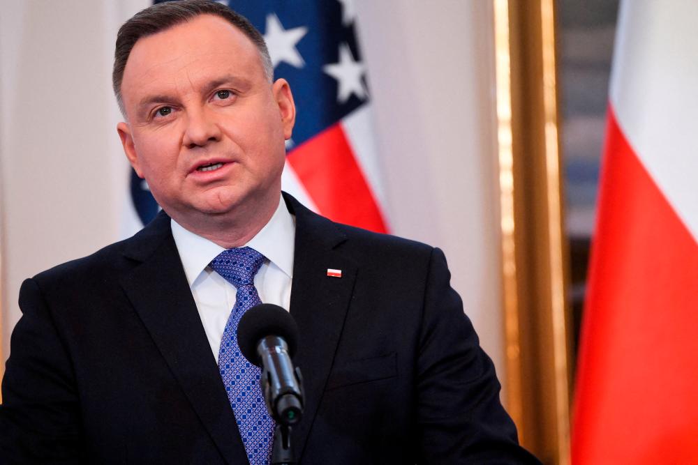 File photo: Polish President Andrzej Duda attends a news conference with U.S. Vice President Kamala Harris (not pictured) at Belwelder Palace, amid Russia's invasion of Ukraine, in Warsaw, Poland March 10, 2022. Saul Loeb/Pool via REUTERSpix