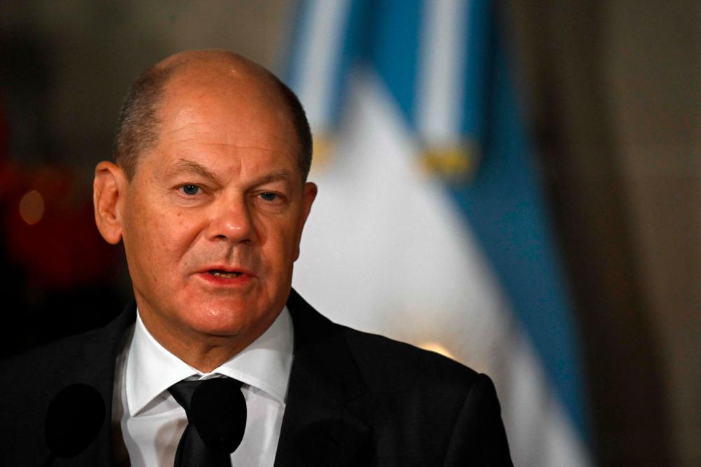 German Chancellor Olaf Scholz speaks during a joint presser with Argentine President Alberto Fernandez (out of frame) at Palacio San Martin in Buenos Aires, on January 28, 2023. AFPPIX