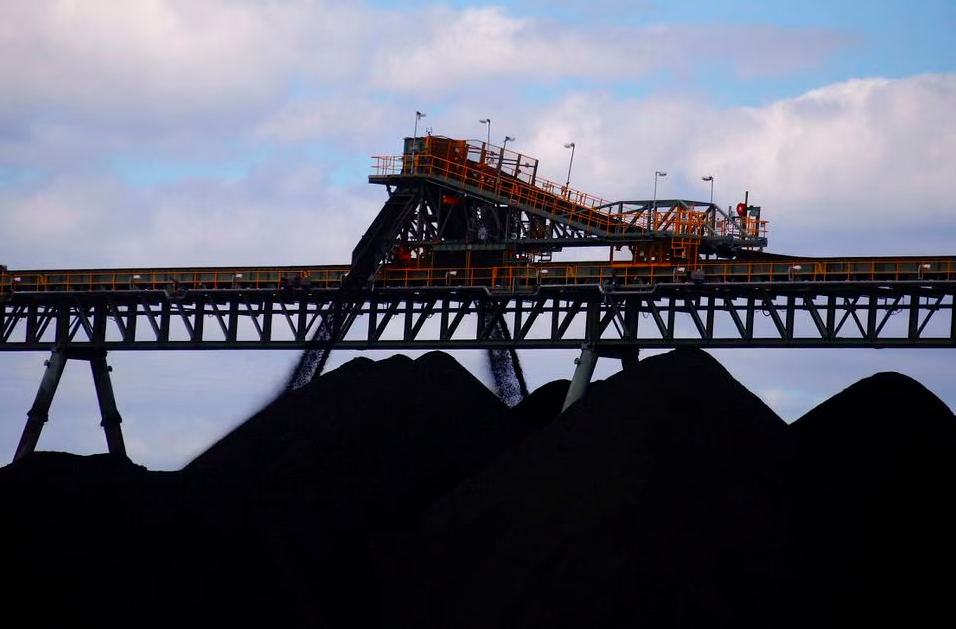 FILE PHOTO: Coal is unloaded onto large piles at the Ulan Coal mines near the central New South Wales rural town of Mudgee in Australia, March 8, 2018. REUTERSPIX