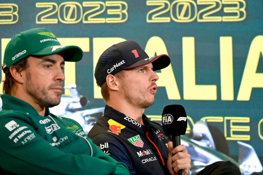 Red Bull Racing’s Dutch driver Max Verstappen (R) speaks at a drivers press conference next to Aston Martin’s Spanish driver Fernando Alonso ahead of the 2023 Formula One Australian Grand Prix at the Albert Park Circuit in Melbourne on March 30, 2023/AFPPix